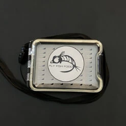 FLY FISH FOOD LOGO FLY BOX, CLEAR SINGLE SIDED - SMALL W/ LANYARD, EASY GRIP FOAM